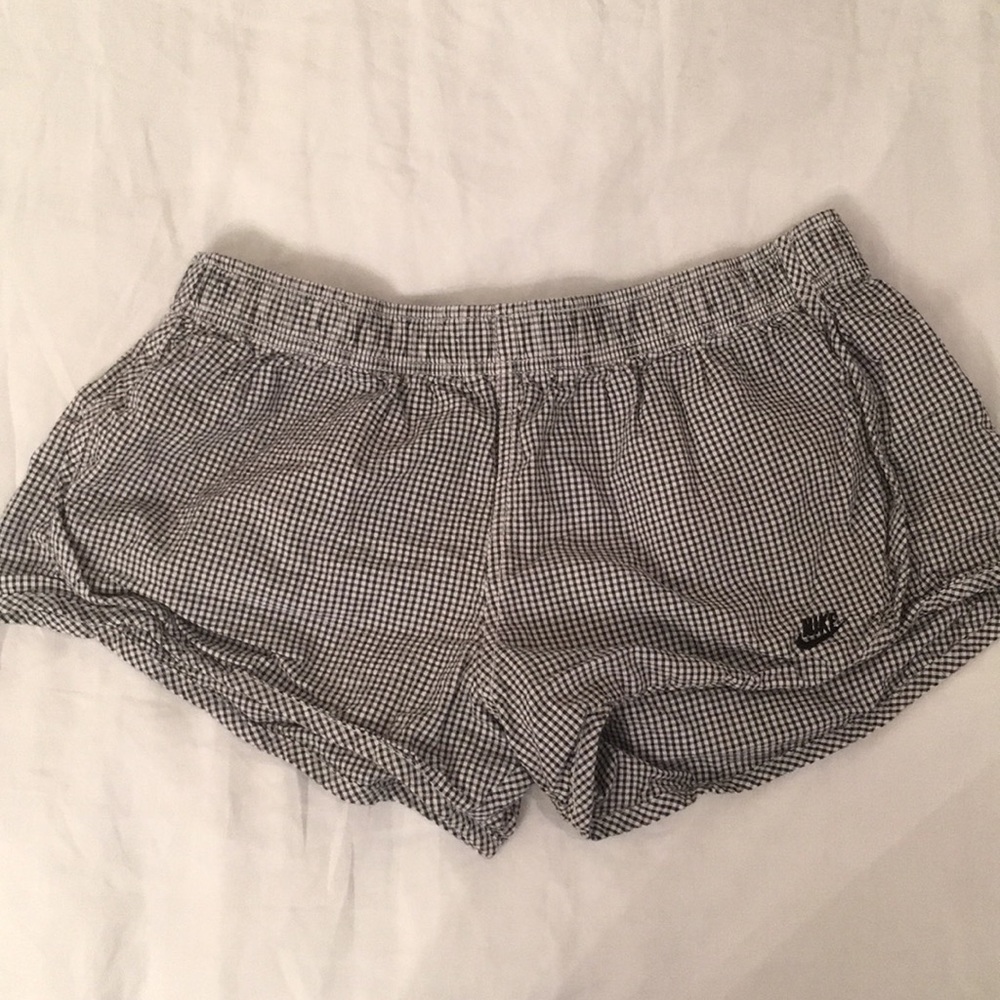 Nike checked shorts.